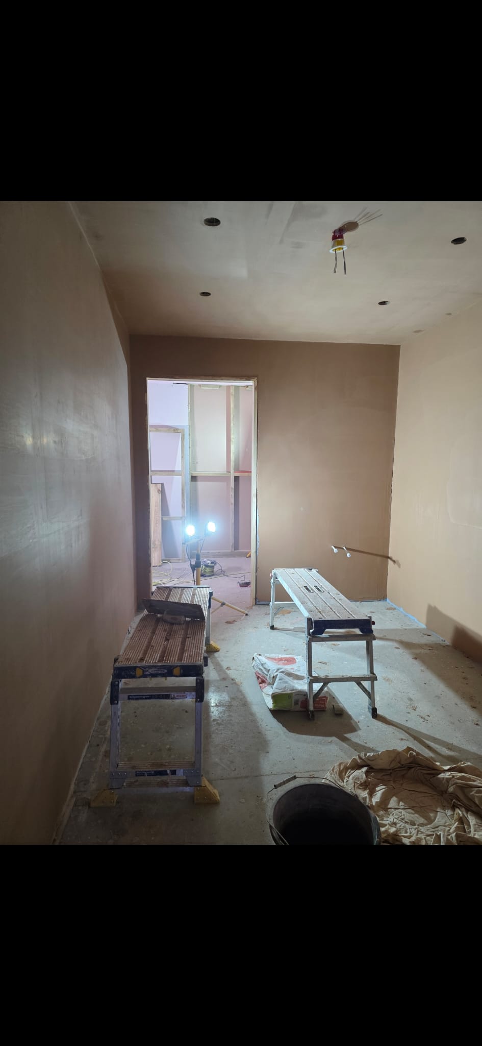 Plastered ceiling and walls