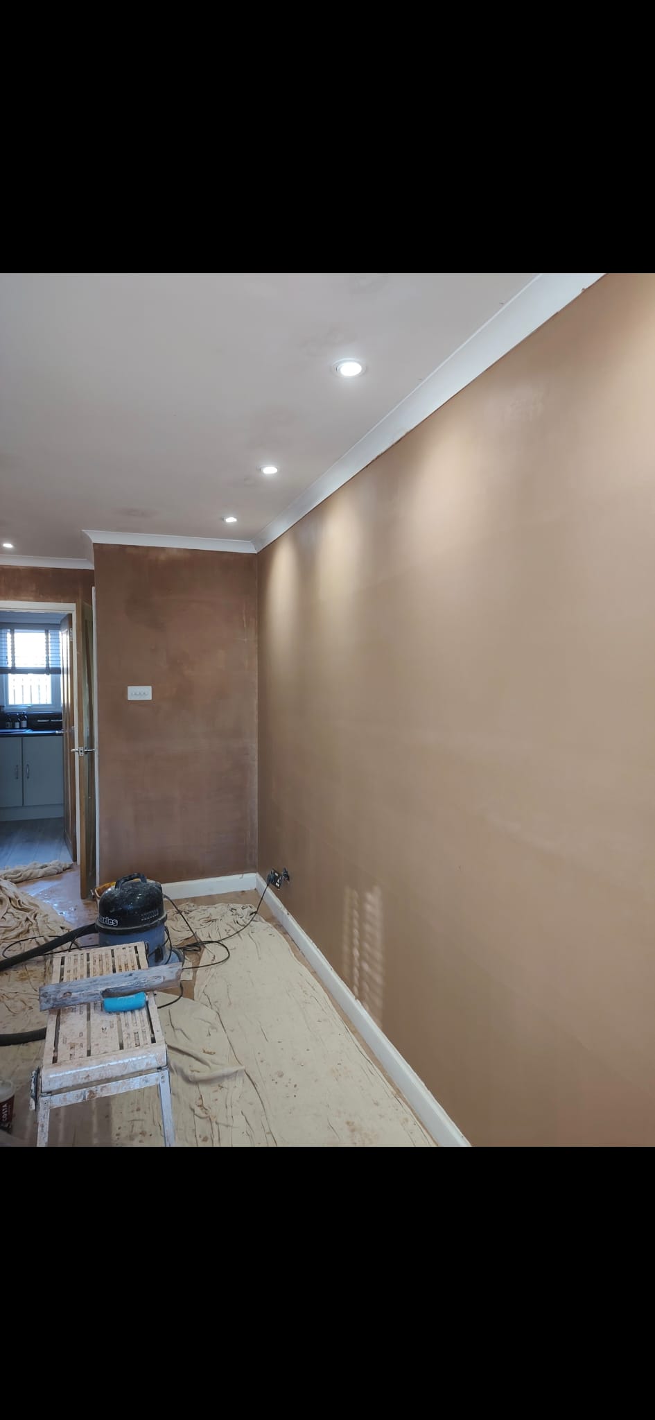 Smooth freshly skimmed plastered walls