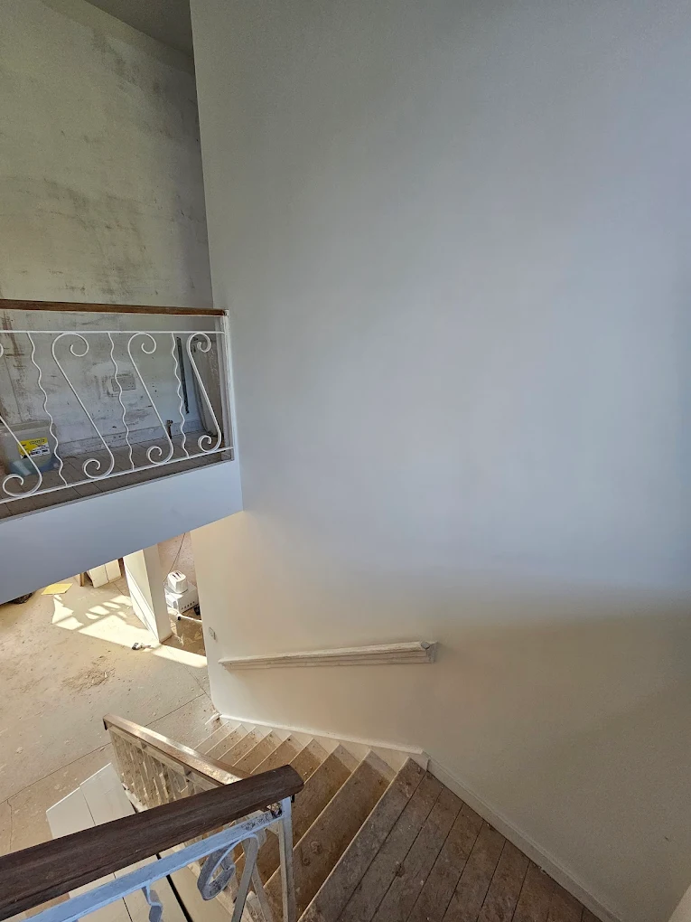 Fireplace media wall plastering project